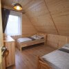 Отель Wooden Holiday Home in Skrzynia With Terrace, фото 2