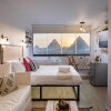 Отель Jacuzzi By The Historic Giza Pyramids - Apartment 4, фото 9