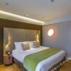 Отель Campanile Hotel Dongying Financial Port в Дунъином