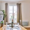 Отель Family Apartment In Buttes Chaumont, фото 7
