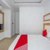 Отель OYO 15111 Greencity Comforts, фото 16