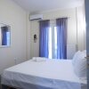 Отель Comfortable Apartment At The Foot of The Odeon of Herodes Atticus, фото 1
