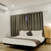 Отель OYO 385 TownHouse Navya International Ramamurthy Nagar, фото 2