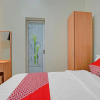 Отель OYO 90804 Oma Uti Homestay Syariah, фото 4