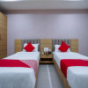 Отель OYO 14745 Veeraj Suites, фото 5