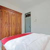 Отель OYO 91092 Rahma Garden Guest House, фото 27