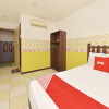 Отель OYO 90792 Hezza Inn, фото 20