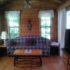 Отель Riverside Log Cabins, фото 1