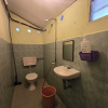 Отель OYO 91042 Kamal Guest House Marang, фото 18