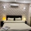 Отель Royal Three Bed Room Villa Dha Phase 6 Lahore, фото 8