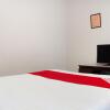 Отель OYO 153 Monclaire Suites, фото 5