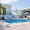 Отель Villa White Sand - Charming villa with breathtaking view over the Spanish Water and indoor Game Room, фото 7