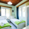 Отель Loggos Seaview Cottage with Pool by Konnect, фото 7
