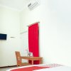 Отель Emas 23 Guest House By OYO Rooms в Маланге