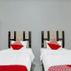 Отель OYO 91505 Elif Homestay Syariah, фото 8