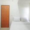 Отель Nice And Homey 2Br At Vida View Makassar Apartment, фото 1