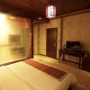 Отель Bo Ai Inn- Lijiang, фото 13