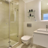 Отель Triangle Luxury Suites by Totalstay, фото 11