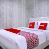 Отель OYO 582 Wisma Bungur Syariah, фото 2