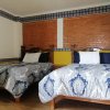 Отель y Suites Axolotl в Чигнауапане