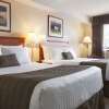 Отель Days Inn & Suites by Wyndham Langley, фото 4