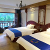 Отель Fenghuang Tujia Ethnic Minority River View Hotel, фото 7