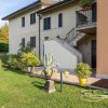 Отель Holiday Appartment With a big Garden, Nearby Lazise's Centre, фото 1
