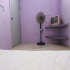 Отель SPOT ON 93276 Fendi 2 Homestay Syariah, фото 12