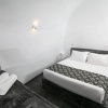 Отель Elysian Santorini Oia Luxury Cave Villa With Outdoor Hot Tub With Sea Sunset View, фото 8