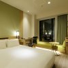 Отель Candeo Hotels Tokyo Shimbashi, фото 34
