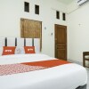 Отель Penginapan Anggrek Syariah 2 by OYO Rooms, фото 3