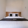 Отель Super OYO Collection O 90023 Damar Kusumo Guest House, фото 7