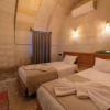 Отель Escape Cave Suites, фото 3