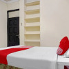Отель OYO 90702 Wisma Tobana Kebayoran, фото 25