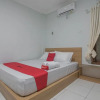 Отель RedDoorz near RSUD Dr. Abdul Aziz, фото 4