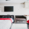Отель RedLiving Apartemen Green Lake View Ciputat - Pelangi Rooms Tower E, фото 3