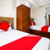 Отель OYO 256 Sakura Suites, фото 3