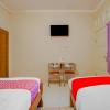 Отель OYO 90210 Kenari House Syariah, фото 15