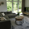 Отель Modern chalet with beautiful garden, located in a holiday park by the forest, фото 22