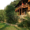 Отель Himalayan Orchard Huts, фото 4