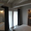 Отель Corte Merighi Charming Rooms & Breakfast в Вероне