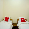 Отель OYO 90173 Innapp Tenggilis Family Residence, фото 5