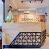 Отель OYO 3905 Graha 100 Guest House Syariah, фото 13