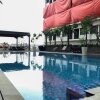 Отель Comfortable Pool View Studio Room At Gateway Park Lrt City Bekasi Apartment, фото 3