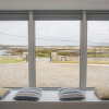 Отель Wave Bay Cottage, фото 16