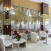 Отель Capital O 615 Residence Puri Hotel Syariah, фото 16