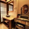 Отель Lijiang Yanlan Cuishe Boutique Inn, фото 6