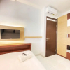 Отель Homey Designed And Cozy 2Br At Mekarwangi Square Cibaduyut Apartment, фото 4