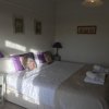 Отель Rie's Retreat - The Amethyst Room в Гластонбери