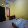 Отель OYO Life 93036 Eddy Homestay Syariah, фото 10